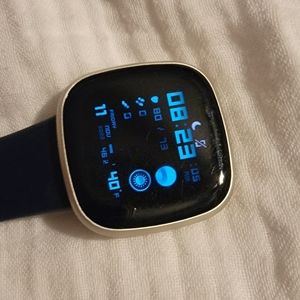 Fitbit Versa 3 (Midnight/Soft Gold Aluminum) with multiple bands